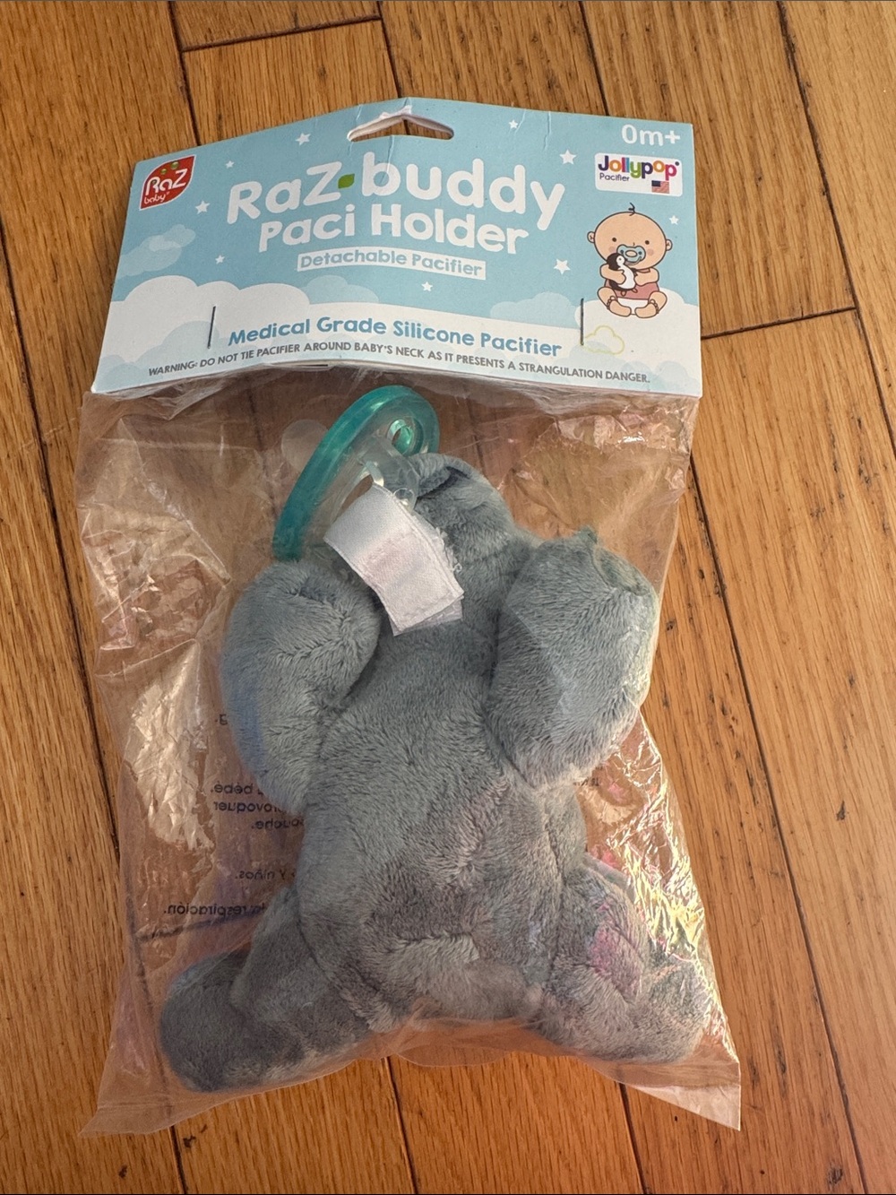 Raz buddy dinosaur Paci Holder with Teal Pacifier